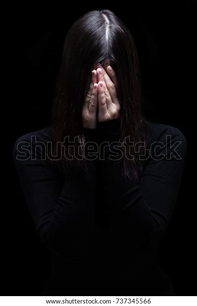 Emotional Woman Crying Covering Face Hands