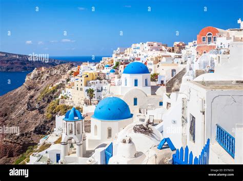 White Houses And Blue Domes In The Village Of Oia Santorini Thira
