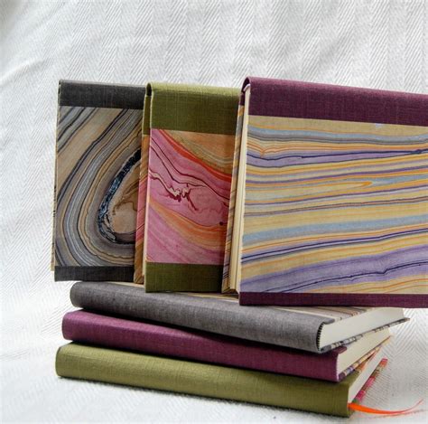 A Collection Of Marbled Notebooks 100 Handbound Can Be Customised To