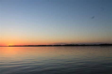 Orange Sunset Over A Lake In Nebraska Free Image Download