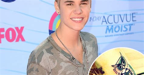 Picture Justin Bieber Gets Tattoo Of An Owl On His Arm Us Weekly