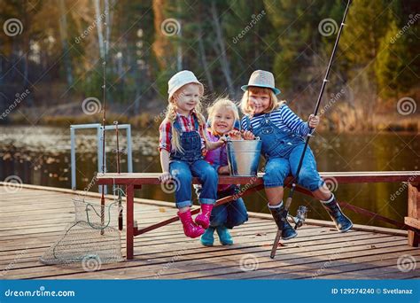 Children Fishing With Fishing Rods Warm Autumn Day Stock Photo Image