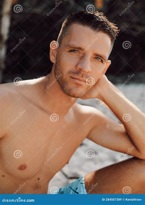 Portrait Of Handsome Topless Male Model On The Beach Stock Image
