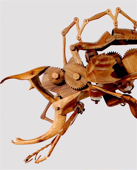 These Giant Kinetic Wood Insects Seamlessly Blend