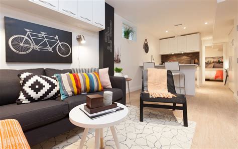 One from the foyer, one from the kitchen, large one from the dining area on the right side of room. How to Decorate Long and Narrow Living Rooms