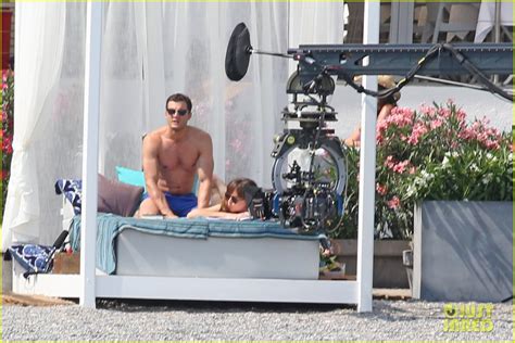 Shirtless Jamie Dornan And Bikini Clad Dakota Johnson Film Fifty Shades Beach Scene Photo