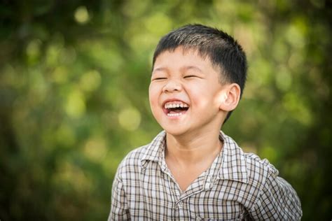 Free Photo Portrait Of Happy Little Boy Laughing While He Play In The