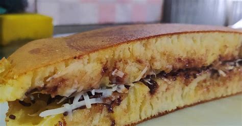 Resep kue bolu selanjutnya ialah mulai mencampurkan terigu dan vanili pada adonan telur yang tadi sudah jadi. Resep Terang bulan teflon (takaran sendok) oleh Yunia ...