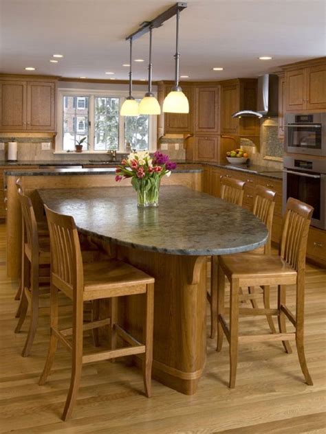 The kitchen island is offset with a wood extension, providing a more casual spot to dine. 13 best Kitchen Islands with attached tables images on ...