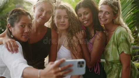 Cheerful Multiracial Girls Take Selfies On Vacation Diverse Young Women Taking Self Portraits