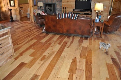 The technique that is used to create these looks is what is called hand scraping. New Hand-Scraped Hickory Floor | Ozark Hardwood Flooring