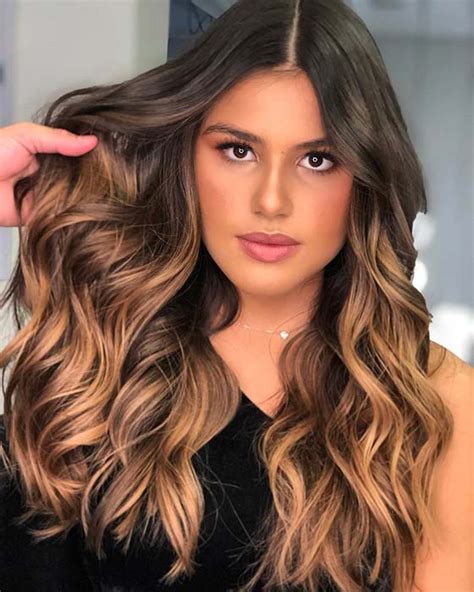 Regardless of your favorite hair color ideas, highlights on dark hair add depth, light, allure and class to women's hairstyles.from light or dark brown to blonde, red, caramel, ombre, platinum, copper and burgundy, there are many black hair with highlights ideas to consider. 23 Best Caramel Highlights Ideas for 2019 | StayGlam