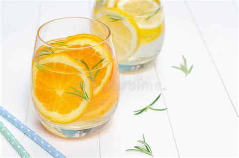 Preparation Of The Lemonade Drink And Orange Juice Lemonade In The Jug