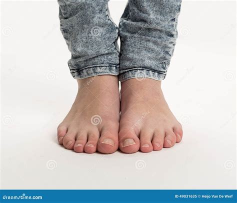 Two Bare Feet Standing On The Floor Stock Photo Image