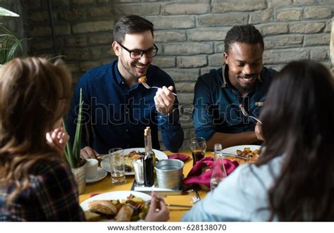 Group Happy Business People Eating Together Stock Photo 628138070