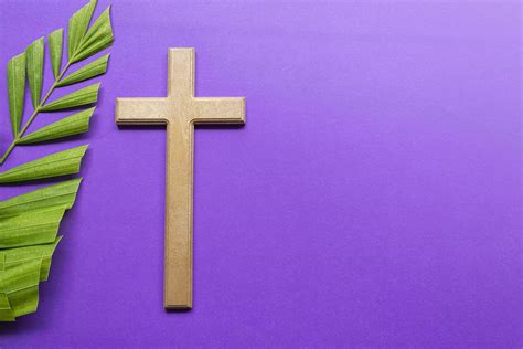 Cross And Palm Leaves On Purple Background Lent Season Concept