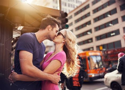 romantic couple kissing in LA | High-Quality People Images ~ Creative Market