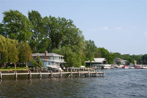 Historic Town Of Green Lake Wisconsin With Houses And Boats View Of The