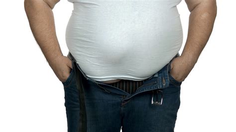Fat Man Trying To Fasten Tight Jeans Obese Person On White Background
