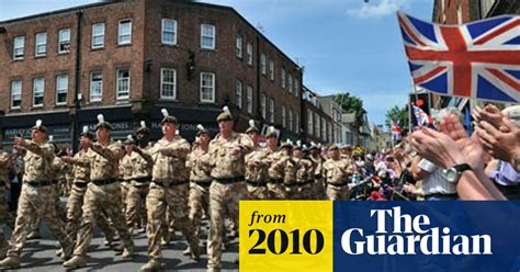 Thousands Line Streets To Mark Return Of Brigade That Lost 64 In
