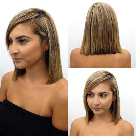 A women's hairstyle where different sections of the hair are cut at different lengths to give the. Blunt Shoulder Length Bob with Side Swept Bangs and ...