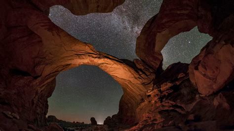 Extreme Wide Angle Image Of The Starry Sky Above The Double Arch Moab