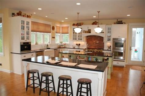 While this is usually true, there is no hard and fast rule an oversized island can more than double the available counter space in your kitchen, while also acting as a perimeter for a kitchen without clearly. Double Island Kitchen House Plans | backsplash classic ...