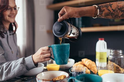 Photos - Boyfriend serving coffee to girlfriend 143443 - YouWorkForThem