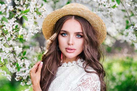 Close Up Portrait Of Sensual Young Woman In The Spring Flowered Garden Stock Image Image Of