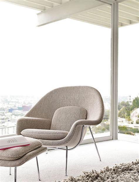 The womb chair design consists of molded fiber glass shell covered with foam and then upholstered. Womb™ Chair - Design Within Reach