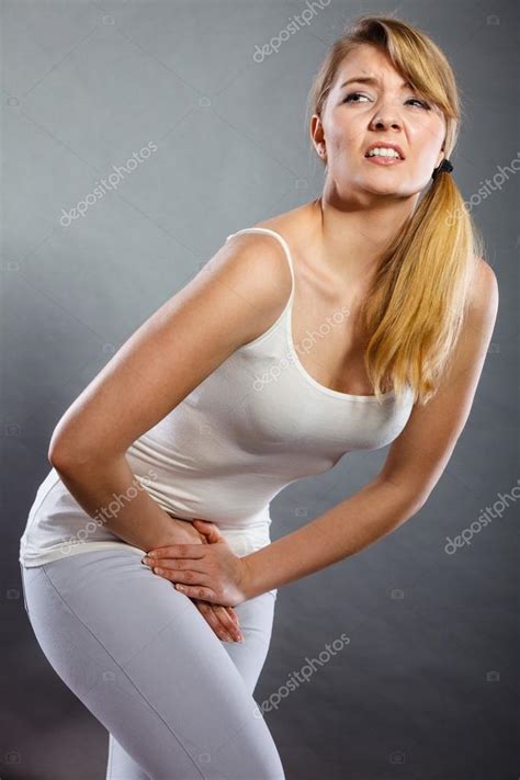 Woman With Hands Holding Her Crotch Stock Photo By Anetlanda