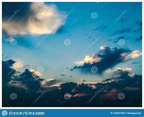 Blue Sky Background With Black Andwhite Clouds  Stock