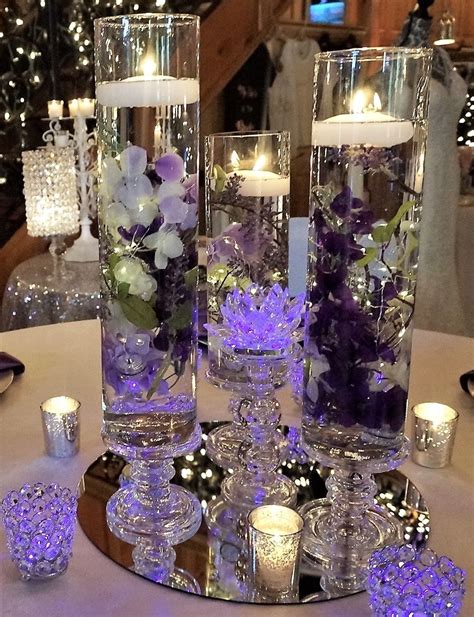This beautiful lilac wedding dress is made with gorgeous lilac lace. Purple and Lavender Wedding Centerpiece | Lavender wedding centerpieces, Diy fall wedding ...