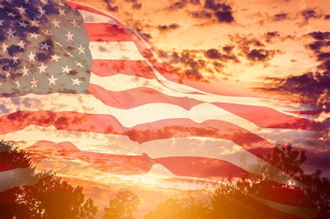 Usa Flag Overlay On Dramatic Sunset Sky Stock Photo Download Image