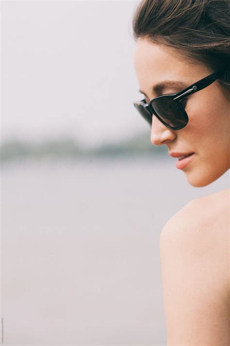 beautiful woman wearing sunglasses by stocksy contributor lumina stocksy