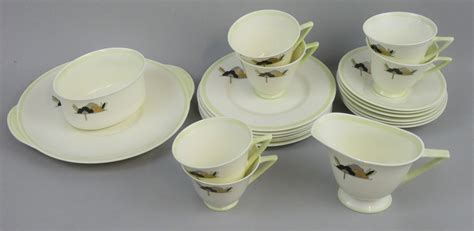A Royal Doulton Art Deco Part Tea Set In The Jewel Pattern Rd No