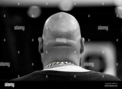 Bald Head Behind Hi Res Stock Photography And Images Alamy