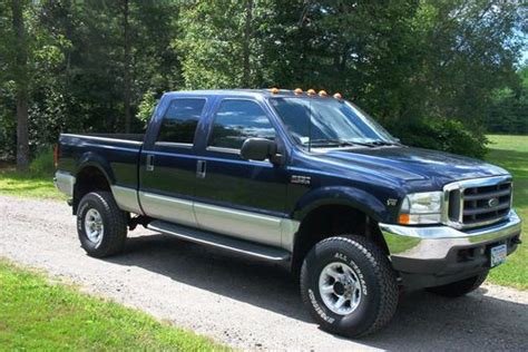 Sell Used 2002 Ford F 250 Super Duty Lariat 4x4 Crew Cab In Orange