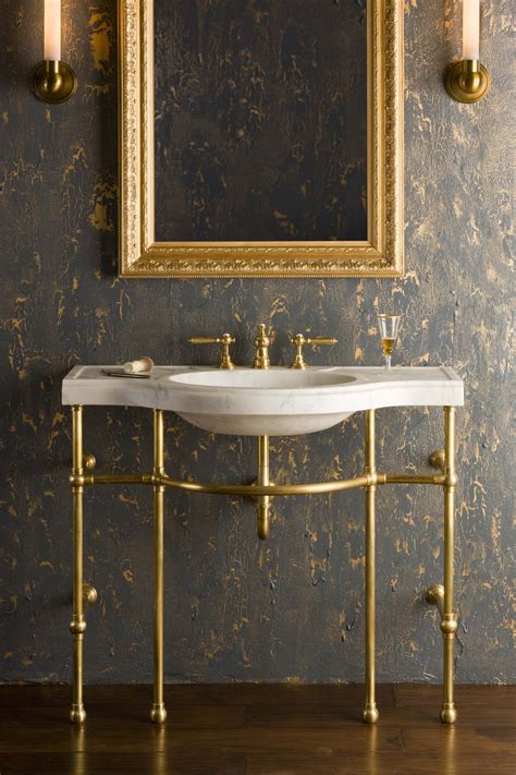 4 Leg Curved Console Shown In Brass With Carrara Marble Sink Available
