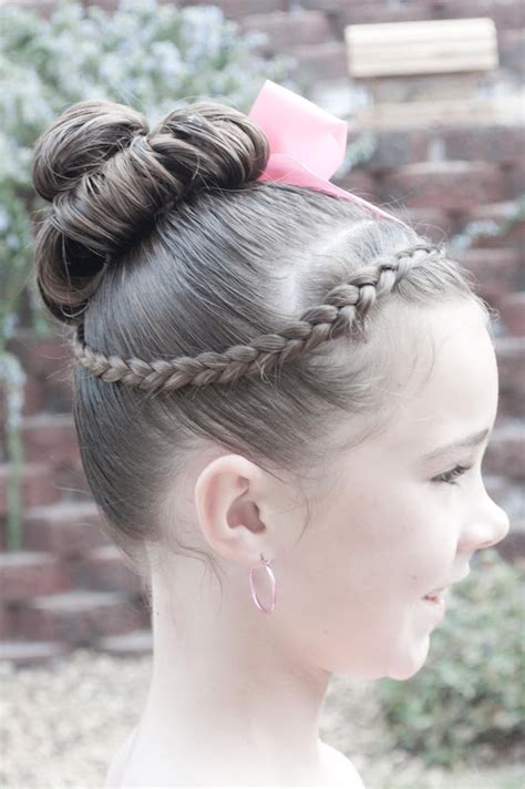 Check out our ballet bun hairstyle selection for the very best in unique or custom, handmade pieces from our shops. This hair is a great option for dance recitals. #dancehair ...