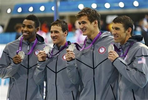 The Us Mens 4x100m Freestyle Relay Team Accepts Their Silver Medals