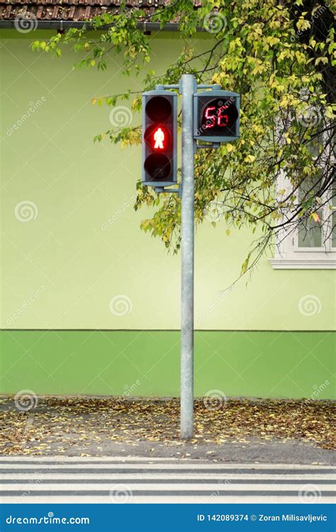 Traffic Light On Pedestrian Crossing Counter Is Counting For Duration Of Red Light Waiting To