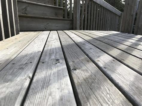 Unfortunately stain doesn't last a lifetime. Deck wood sprayed lifetime stain treatment | Brad the Painter