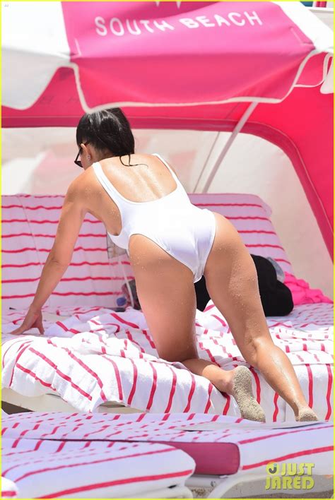 Kourtney Kardashian Shows Off Killer Body In White Swimsuit Photo Kourtney Kardashian