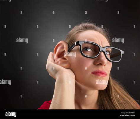 Woman Is Listening To With Big Ear Stock Photo Alamy