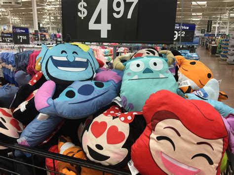 Michael wins at another emoji pillow claw machine. New Disney Emoji Pillows At Walmart