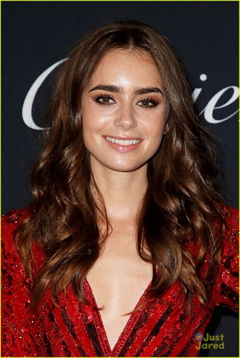 lily collins turns heads in ruby red look for cartier party photo 1183233 photo gallery