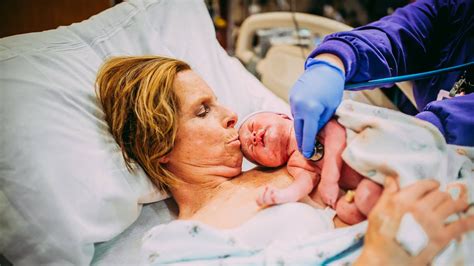 woman 61 gives birth to her own granddaughter after acting as surrogate for son us news
