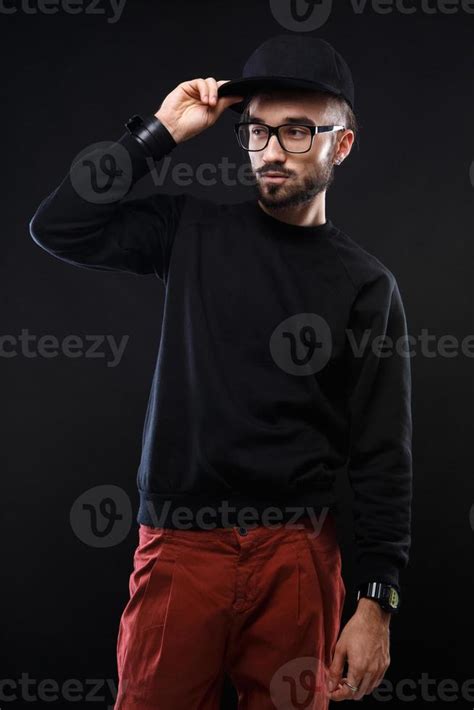 Charismatic Guy In A Black Sweater Emotions 1241995 Stock Photo At