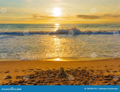 sunset at venice beach ocean and sandcastle stock image image of beauty footprints 283595193